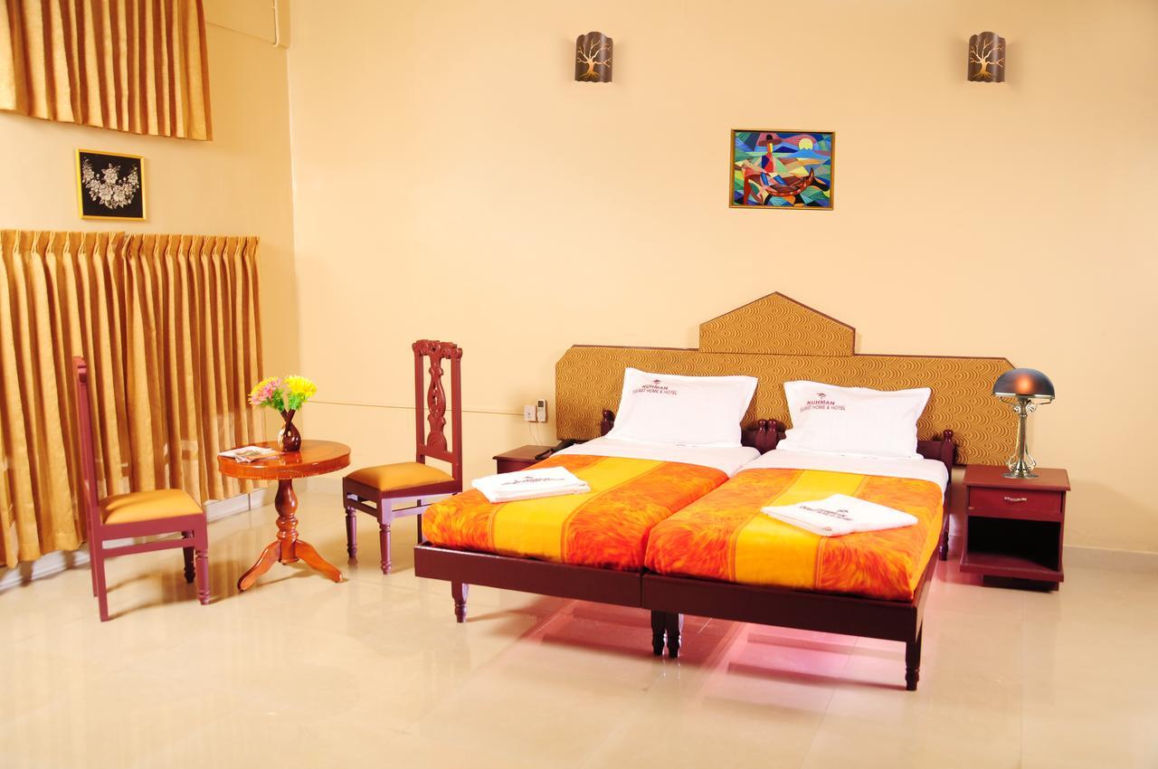 Hotel Nuhman Kondotty Buitenkant foto